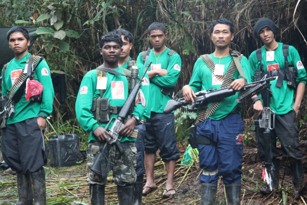 New People’s Army guerrillas gather at an undisclosed camp somewhere in the southern Philippine island of Mindanao in 2011. (Dennis Jay Santos/BenarNews)