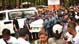 Thousands mourn at funeral for Philippine governor killed by gunmen