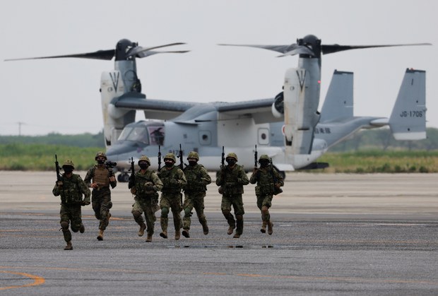 Japan raises defense spending to deal with China challenge Japan raises defense spending to deal with China challenge