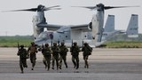 Japan raises defense spending to deal with China challenge