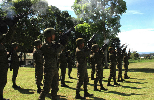 A Philippine Army platoon renders a gun salute as a sign of respect during the wreath-laying ceremony at the heroes’ landmark inside the 103rd Infantry Brigade headquarters in Marawi, Oct. 17, 2019.(Photo: Richel V. Umel/BenarNews)