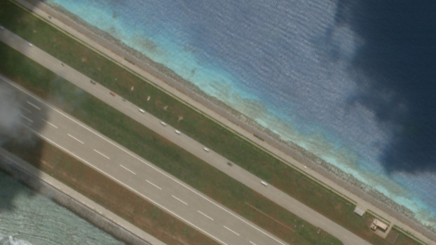A few cars convoy at Subi Reef next to its airstrip, Aug. 27, 2020. [Planet Labs Inc.]