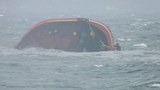Oil tanker sinks in typhoon-whipped Philippines’ Manila Bay