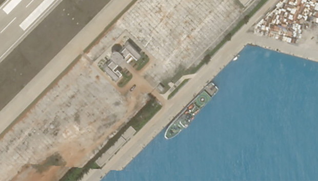 A closer-cropped view of the Feb. 23 satellite image of Fiery Cross Reef showing what appears to be Chinese rescue vessel Nan Hai Jiu 115, which ship-tracking software shows was at that location on the same day. [Planet Labs Inc.]