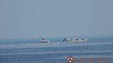 Philippines rejects China’s claim its navy boat was driven away from disputed reef