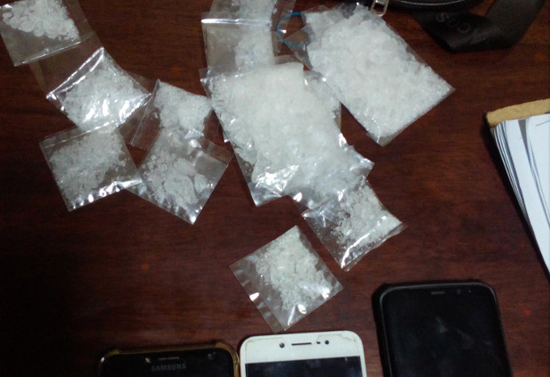Philippine police display packets of narcotics, cellphones and drug paraphernalia allegedly confiscated from the home of former town mayor Talib Abo Sr., and his brother during pre-dawn anti-drug operations, Jan. 4, 2019. [Mark Navales/BenarNews]