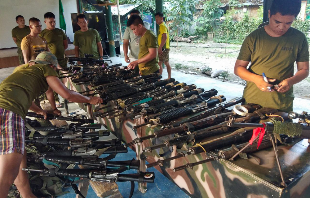 Members of the Philippines Army examine the weapons they recovered from followers of Moro National Liberation Front (MNLF) leader Nur Misuari in Buluan town, capital of the southern province of Maguindanao, Sept. 15, 2019. (Photo: Handout/Philippine Army)