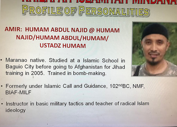 A profile and photograph of Filipino militant Abu Dar is seen in this photograph handed out to reporters by the Philippine Army, January 2018. [HO/Philippine Army]