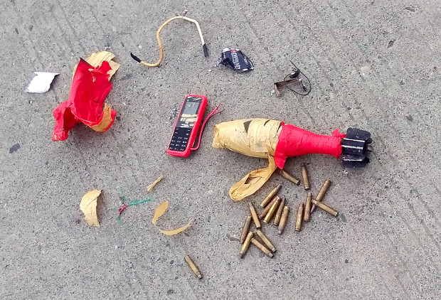Bomb components are seen on the ground after Philippine security forces killed two suspected members of the IS-affiliated Bangsamoro Islamic Freedom Fighters in the southern Philippine town of M'lang, Aug. 8. 2018. [HO/Philippine Army 6ID]