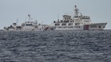 Philippines says 200-plus Chinese vessels have clustered in its EEZ