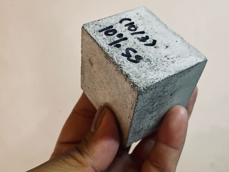 A sample of cement cube made from ash from the Taal volcano is seen in this photo during an interview at the Ateneo de Manila University in Quezon City, Metro Manila, Feb. 19, 2025.