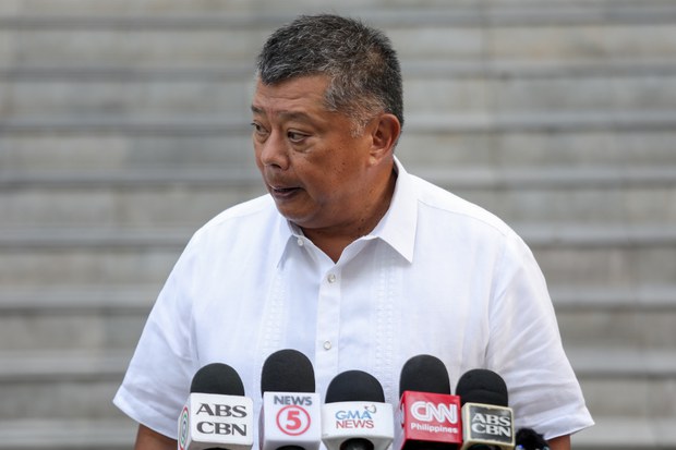 Three Philippine police officers accused of killing Spanish surfer surrender Three Philippine police officers accused of killing Spanish surfer surrender