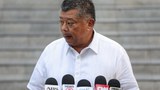 Three Philippine police officers accused of killing Spanish surfer surrender