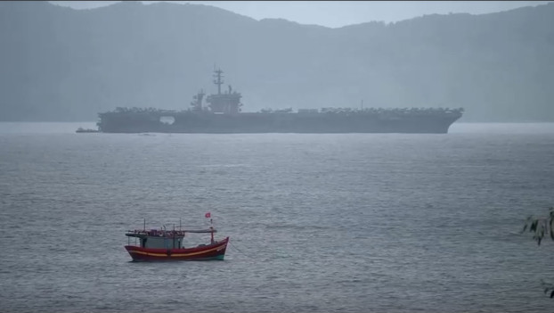 The USS Theodore Roosevelt is seen during a port call in Danang, Vietnam, marking 25 years in the normalization of US-Vietnamese diplomatic relations, March 5, 2020. [Screengrab from Reuters video]
