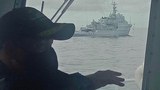 Philippine Coast Guard Challenges Chinese Warship in Territorial Waters