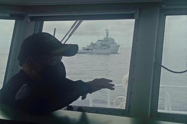Philippine Coast Guard Challenges Chinese Warship in Territorial Waters Philippine Coast Guard Challenges Chinese Warship in Territorial Waters