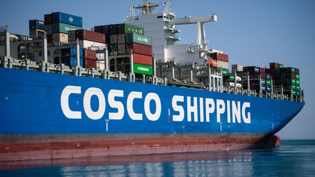 A cargo ship leaves the Fos-Sur-Mer harbor, in Marseille, southern France, July 23, 2020. (AFP)