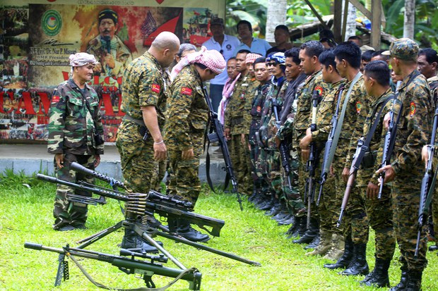 Gunmen launch deadly attack on southern Philippine Muslim community Gunmen launch deadly attack on southern Philippine Muslim community