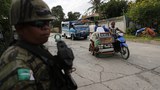 Philippine police hunt for 6 IS-linked militants in officers’ killings