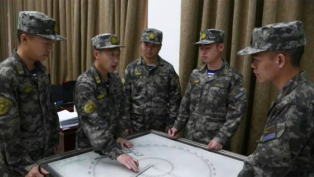 Chinese troops drive away fishing vessels from disputed waters Chinese troops drive away fishing vessels from disputed waters