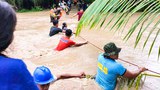 Widespread flooding from tropical storm drowns dozens in southern Philippines