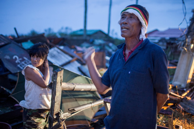Jimmy and Anita Mirafuente react to seeing their home destroyed by Typhoon Mangkhut in Aparri province, Sept. 16, 2018. (Luis Liwanag/BenarNews)