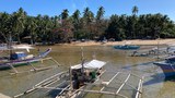 Tensions simmer near a shoal both China and the Philippines claim