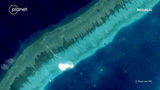 Vietnam rapidly builds up South China Sea reef, satellite data shows