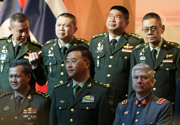 Lt. Gen. Zhang Mingcai, deputy commander of China’s People’s Liberation Army (front row, center), participates in a group photo during the opening of the Indo-Pacific Army Chiefs Conference. [Pimuk Rakkanam/BenarNews]