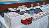 Buddhist monks arrested on charges of embezzling nearly $9M from Thai temple