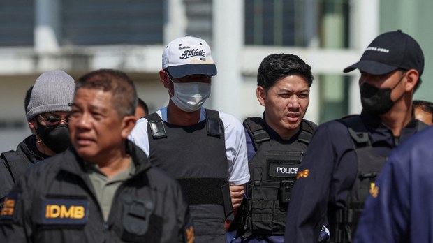 Thailand charges suspect in killing of Cambodian government critic Thailand charges suspect in killing of Cambodian government critic