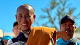 Bodyguard for Vietnamese monk controls his every move