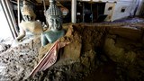 Northern Thai residents face long battle to clear mud, waste from floods