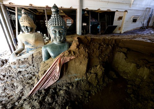Buddha statues covered in mud are seen in Mae Sai district, in northern Thailand’s Chiang Rai province, Oct. 25, 2024.