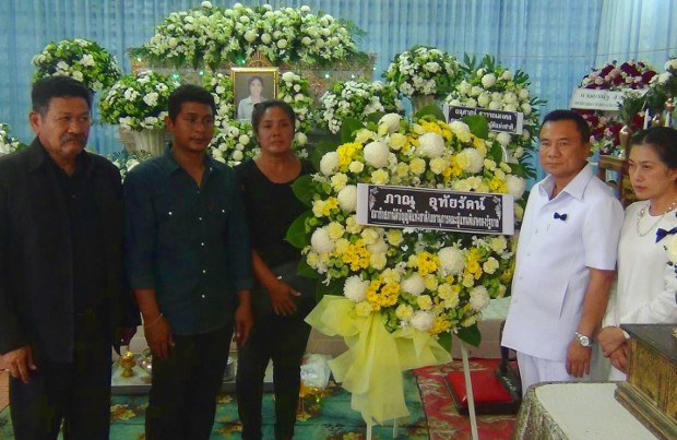 TH-woman-funeral-620 TH-woman-funeral-620